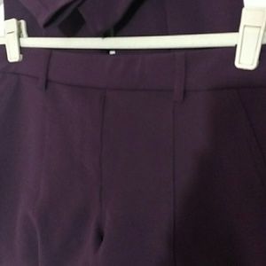 Express PLUM colored skinnys